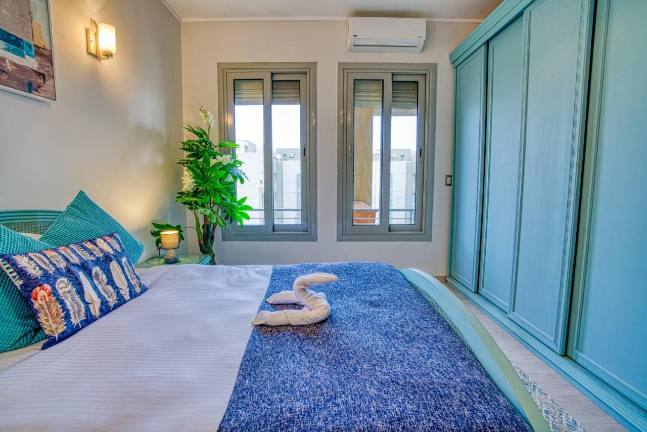 The Suites Near Auc By Elegant Cairo Exterior photo