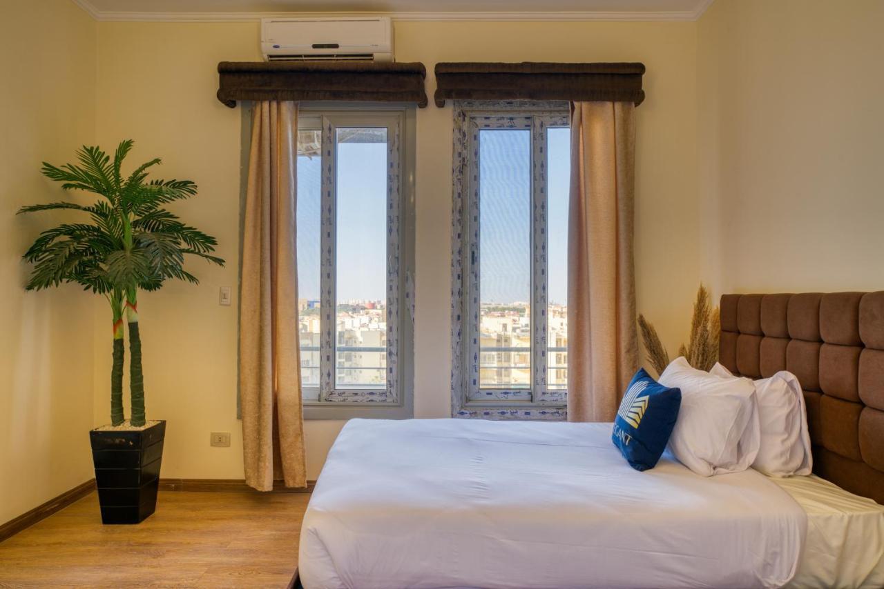 The Suites Near Auc By Elegant Cairo Exterior photo
