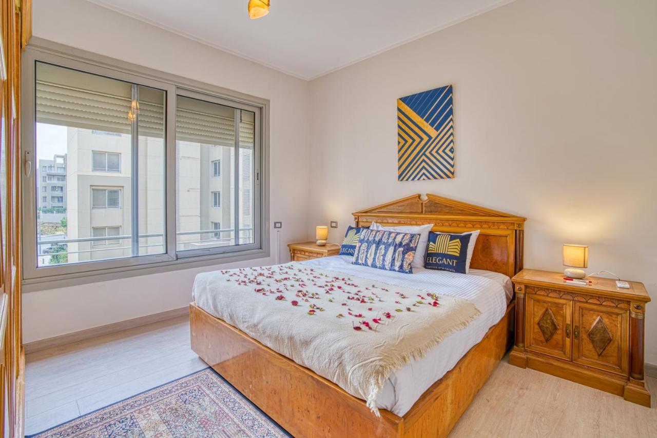 The Suites Near Auc By Elegant Cairo Exterior photo