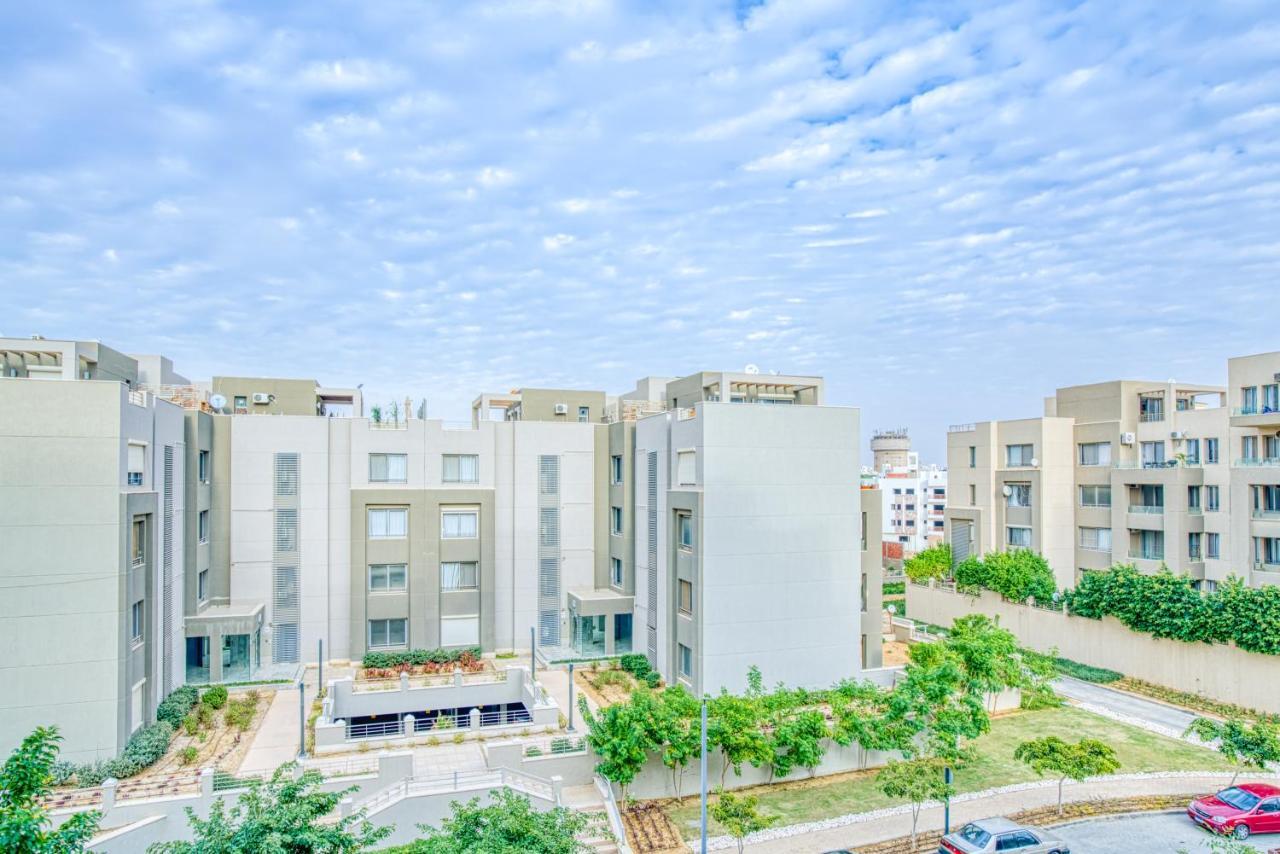 The Suites Near Auc By Elegant Cairo Exterior photo