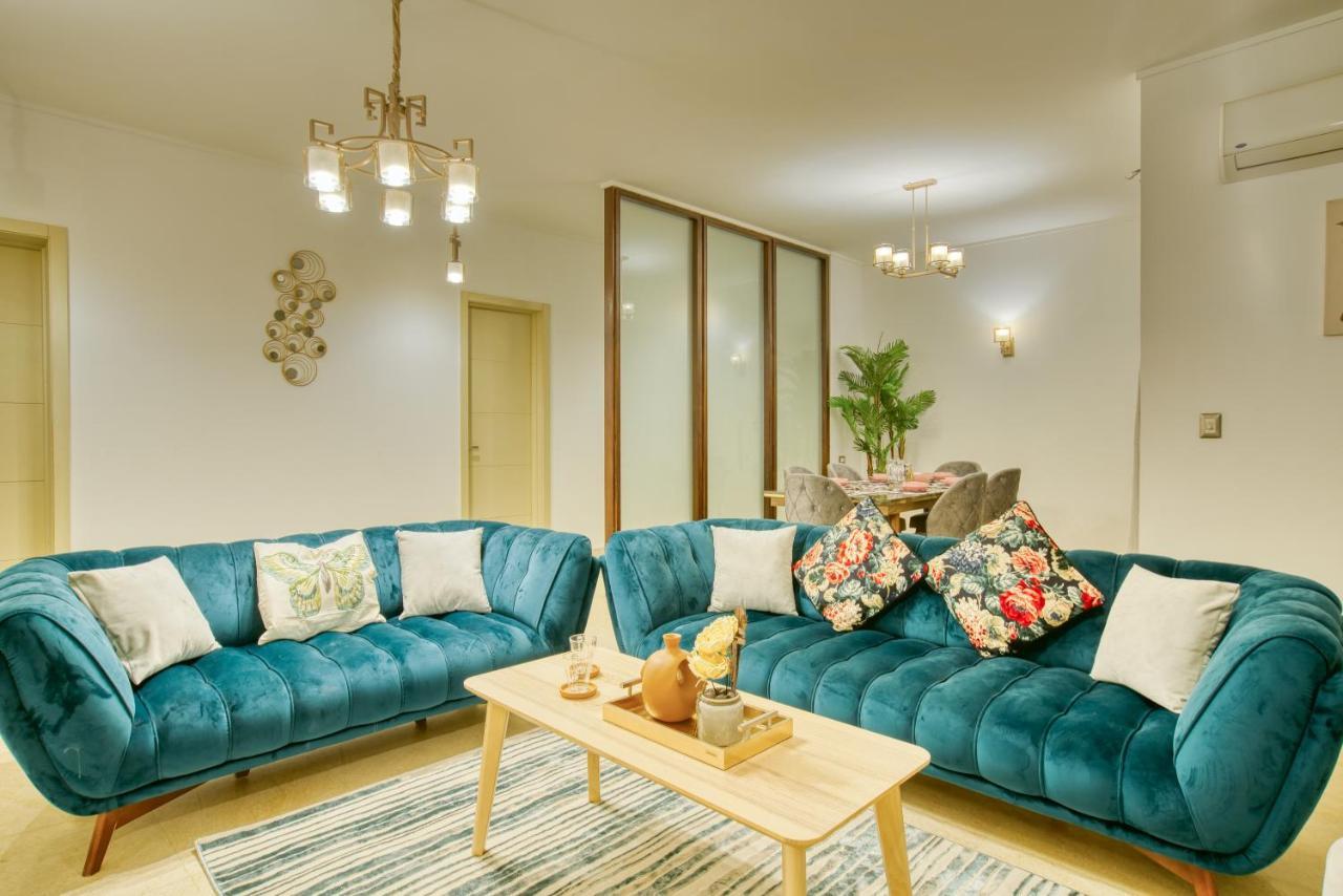 The Suites Near Auc By Elegant Cairo Exterior photo