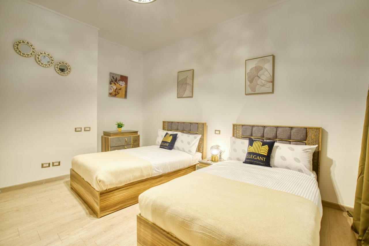 The Suites Near Auc By Elegant Cairo Exterior photo