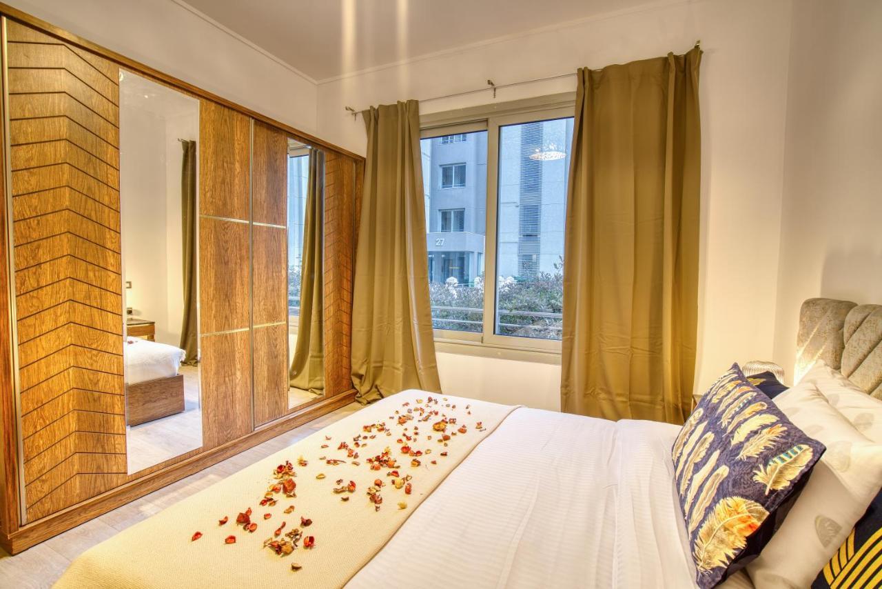 The Suites Near Auc By Elegant Cairo Exterior photo